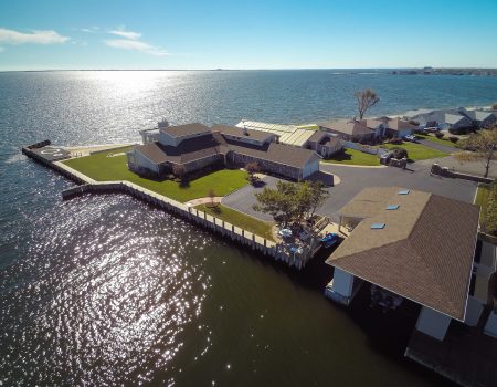 An aerial photo of lake front homes by Daniel Jenney.
