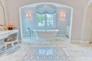 Photo of a modern bathroom with a large soaker bathtub.