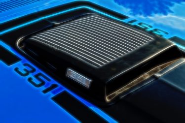 Air scoop on a classic mustang in a blazing 1970s era blue
