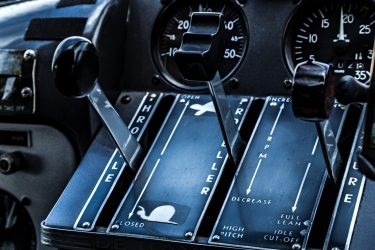 Classic controls of a 1950s era Beaver plane airplane, controls, chroms, black, lever, handles, plane, single engine, beaver, classic plane